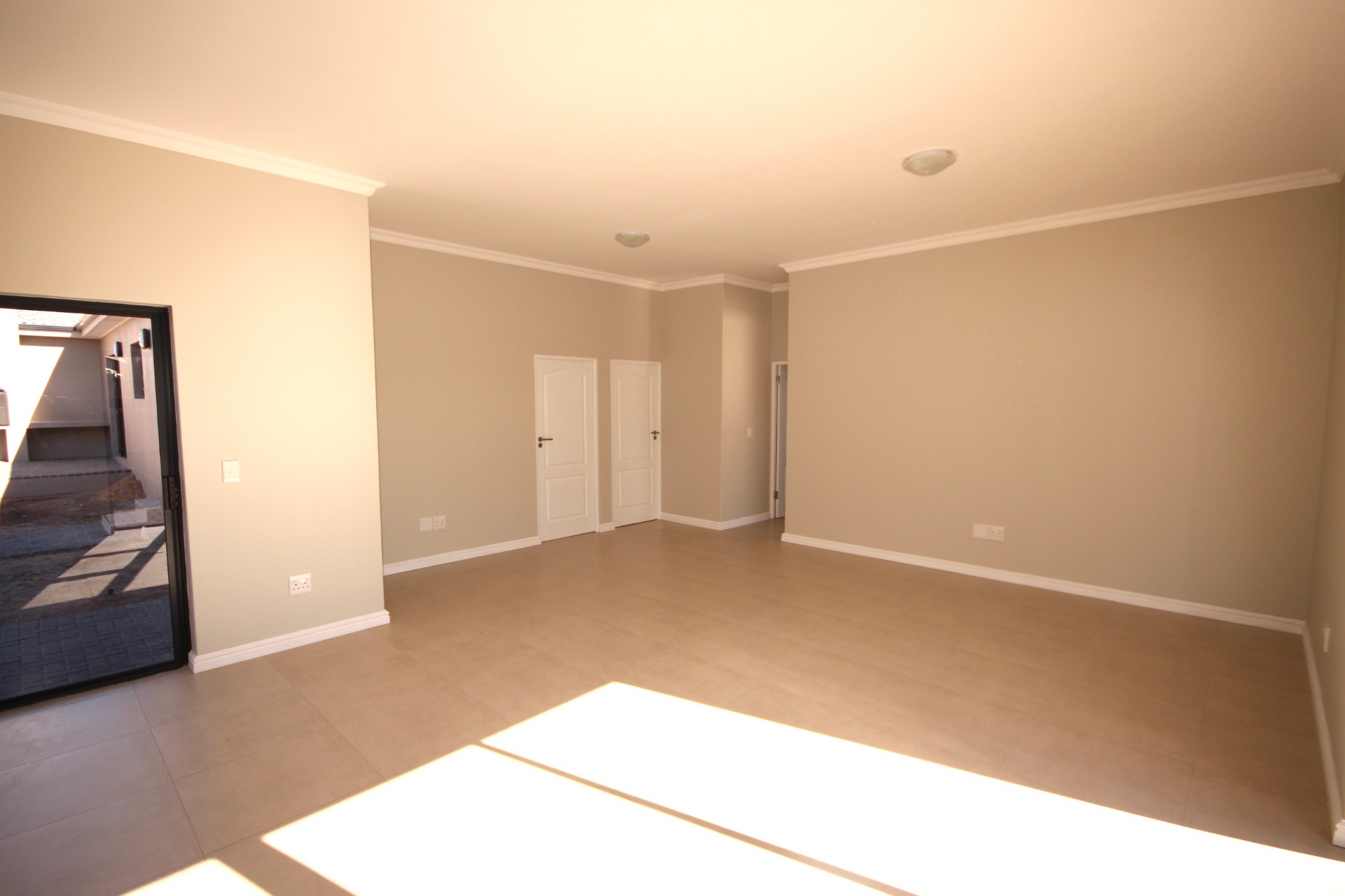 Spacious lounge with patio access