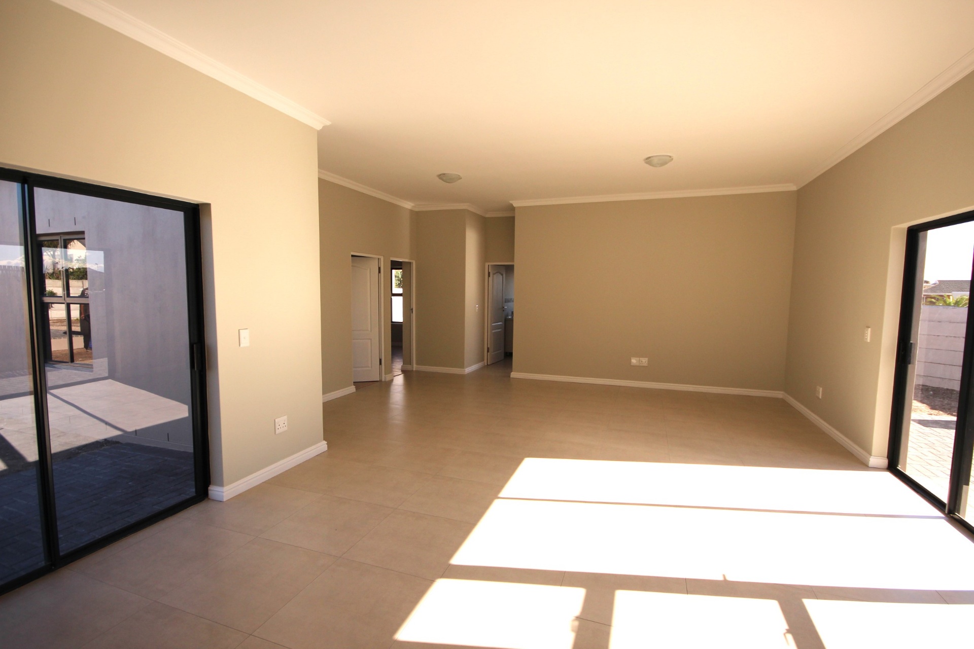 Open-plan living area with patio access