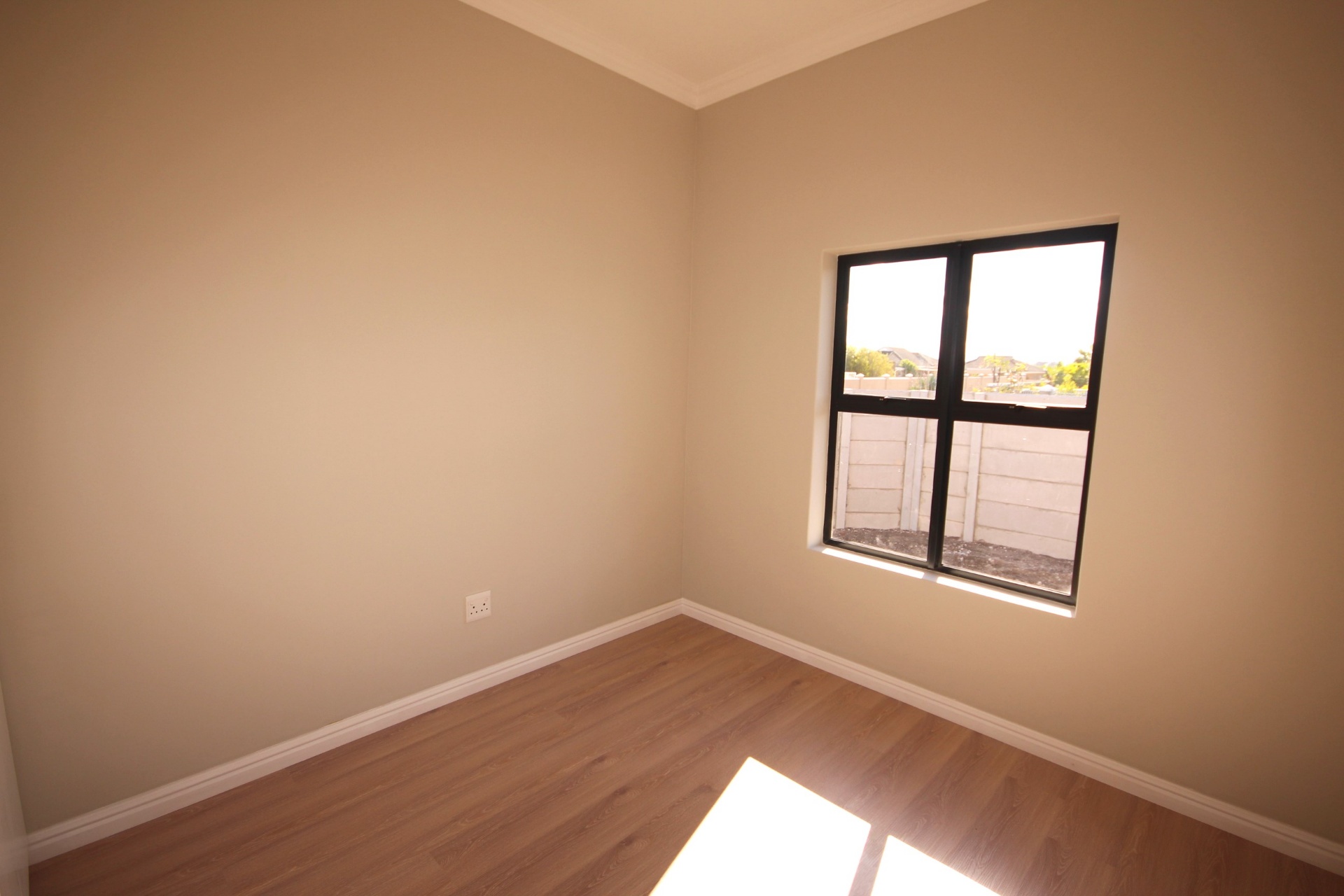 Bedroom with laminate flooring