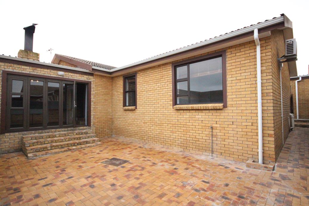 Paved rear courtyard
