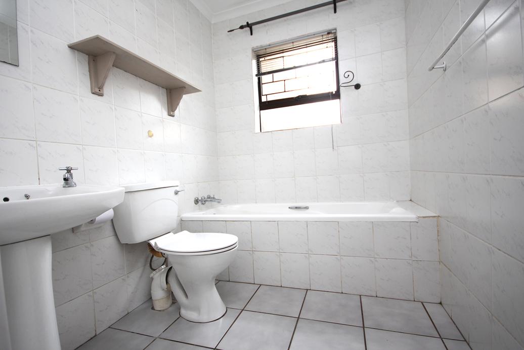 Main bathroom with bath